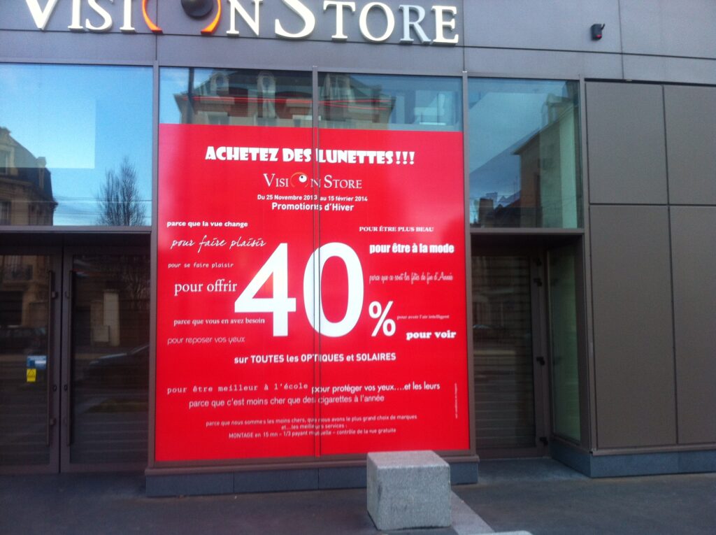 Vitrine Vision Store - agence publicité bois guillaume